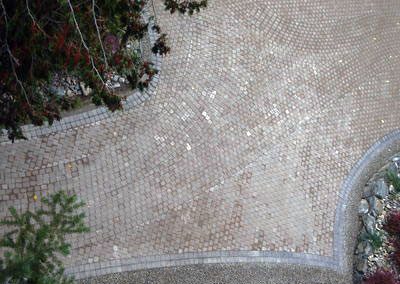 Aerial view of large 10,000 square ft driveway.