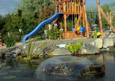 Pond with nice play structure.